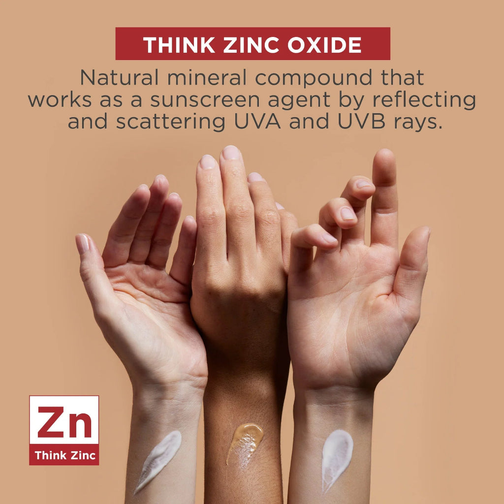 Three hands with different skin tones holding a beige color swatch, with text about zinc oxide and Think Zinc branding.