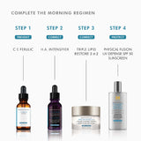 SkinCeuticals C E Ferulic shown as part of a complete morning skincare regimen with cleanser, serum, and sunscreen products on a clean vanity setup