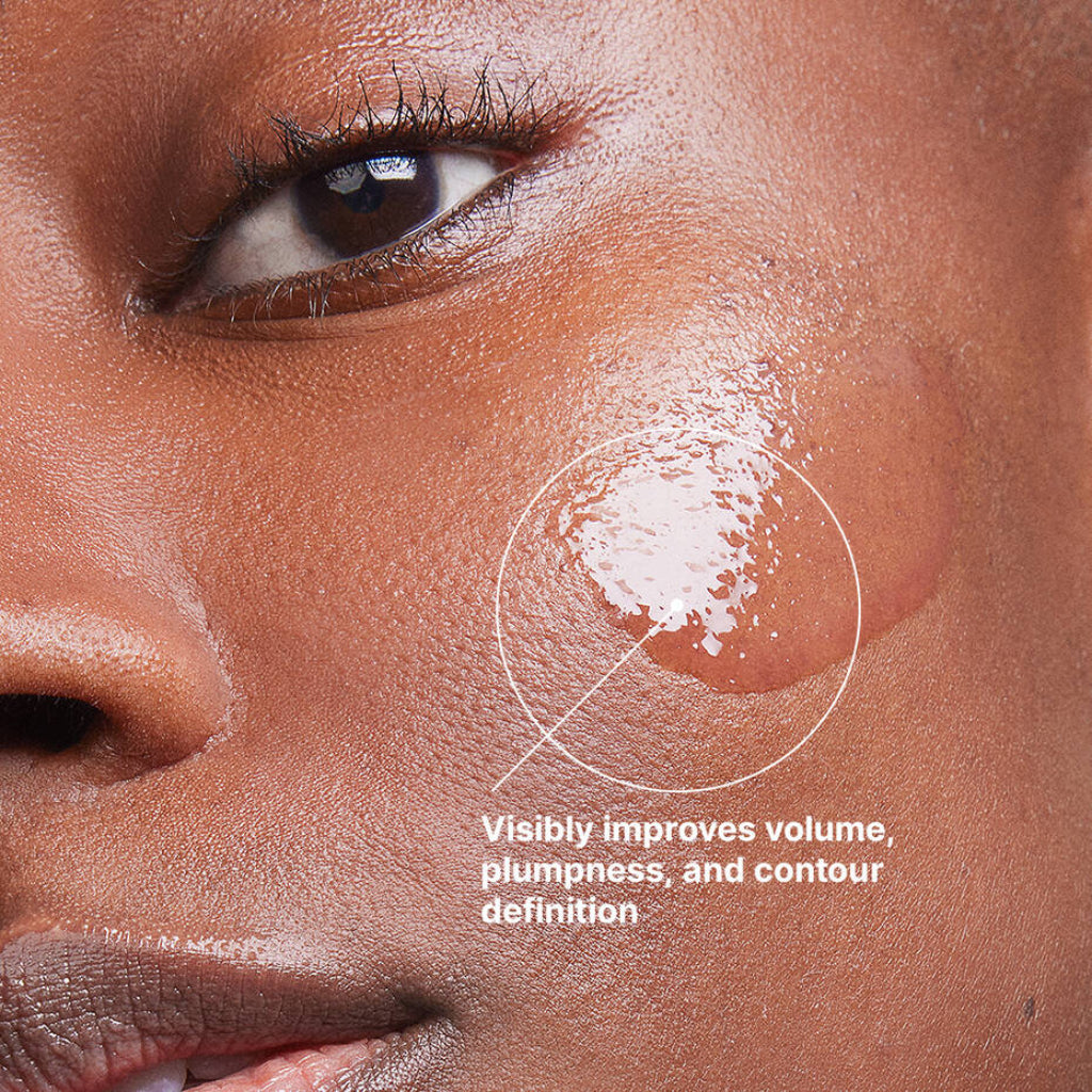 Swatch of SkinCeuticals H.A. Intensifier Multi-Glycan serum on the cheek of a dark-skinned woman – highlighting the serum’s lightweight, translucent texture and smooth absorption.