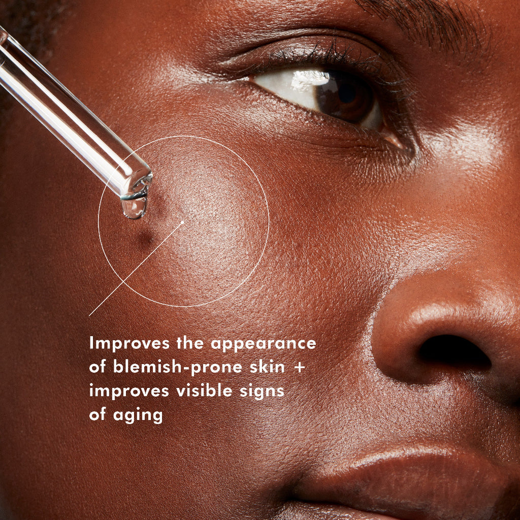 Swatch of SkinCeuticals LHA Serum applied on dark skin, showcasing its lightweight, clear texture and quick absorption for oily and acne-prone skin types.