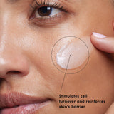 Close-up of a woman's face with a focus on her skin, showing SkinCeuticals Metacell B3 application and text about skin care benefits.