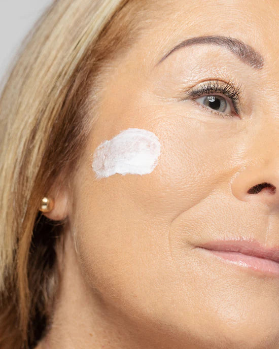 Applying Vivier Retinol 0.3% to the face for smoother skin, reduced fine lines, and a youthful glow