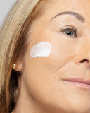 Applying Vivier Retinol 0.3% to the face for smoother skin, reduced fine lines, and a youthful glow