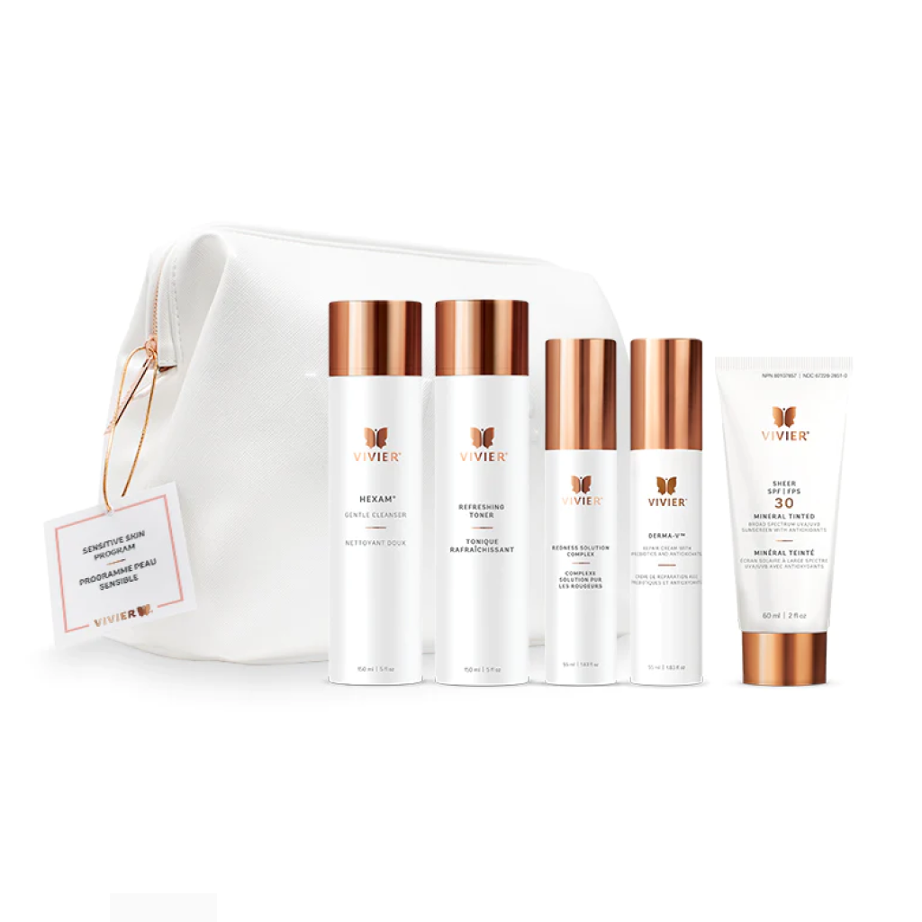 Close-up view of Vivier-Sensitive-Skin-Program products, including HEXAM®, Refreshing Toner, Redness Solution Complex, DERMA-V™, and SHEER SPF 30 Mineral Tinted, displayed in a Vivier-branded vegan leather bag