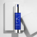 Product image of ZO Brightalive® Skin Brightener placed in front of a clean white boxes, highlighting its elegant silver and blue packaging and advanced formula for brightening skin, fading dark spots, and improving overall clarity