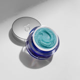 Close-up of ZO Exfoliating Polish textured cream – vibrant blue exfoliant with fine magnesium crystals designed to smooth skin, unclog pores, and enhance radiance