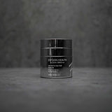 Stylish product image of ZO Growth Factor Serum (30ml) presented against a sophisticated grey background, showcasing the elegant silver and blue packaging of this lightweight serum designed to firm skin, smooth wrinkles, and enhance elasticity