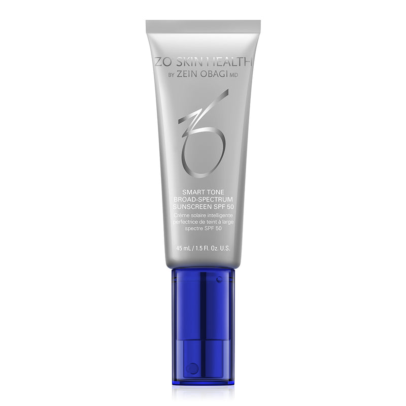 Product image of ZO® Smart Tone Broad-Spectrum SPF 50 in sleek silver and white packaging, formulated to provide high-level UVA/UVB, blue light, and infrared protection with a tint that adapts to most skin tones for a smooth, even finish.