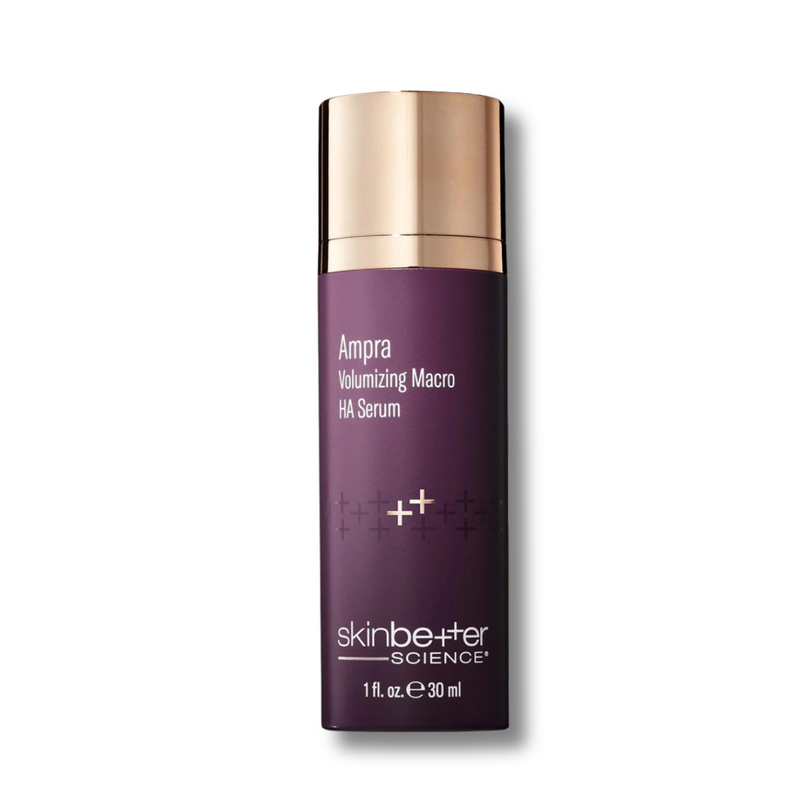 Purple skincare serum bottle with gold cap on a white background