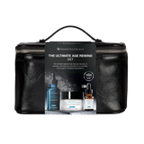 SkinCeuticals The Ultimate Age Rewind Set in a black faux-leather zippered case with a black handle, featuring a promotional card in front showing three skincare bottles and jars.