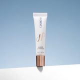 Hydrinity Luxe Lip hydrator tube with gold cap on a light blue background