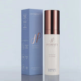 A bottle of Hydrinity Renewing HA Serum side by side its retail box on a light blue background