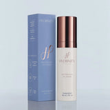 Hydrinity Restorative HA Serum bottle with its retail box on the side on light blue background