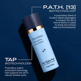 Skincare Mystro Revive Renewing Serum bottle with text about P.A.T.H. [13] Biotechnology and TAP Biotechnology on a dark blue background.