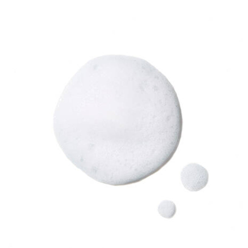 Close-up of SkinBetter Science Refining Foam Cleanser foamy texture swatch, showcasing its lightweight, airy consistency for gentle exfoliation