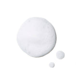 Close-up of SkinBetter Science Refining Foam Cleanser foamy texture swatch, showcasing its lightweight, airy consistency for gentle exfoliation