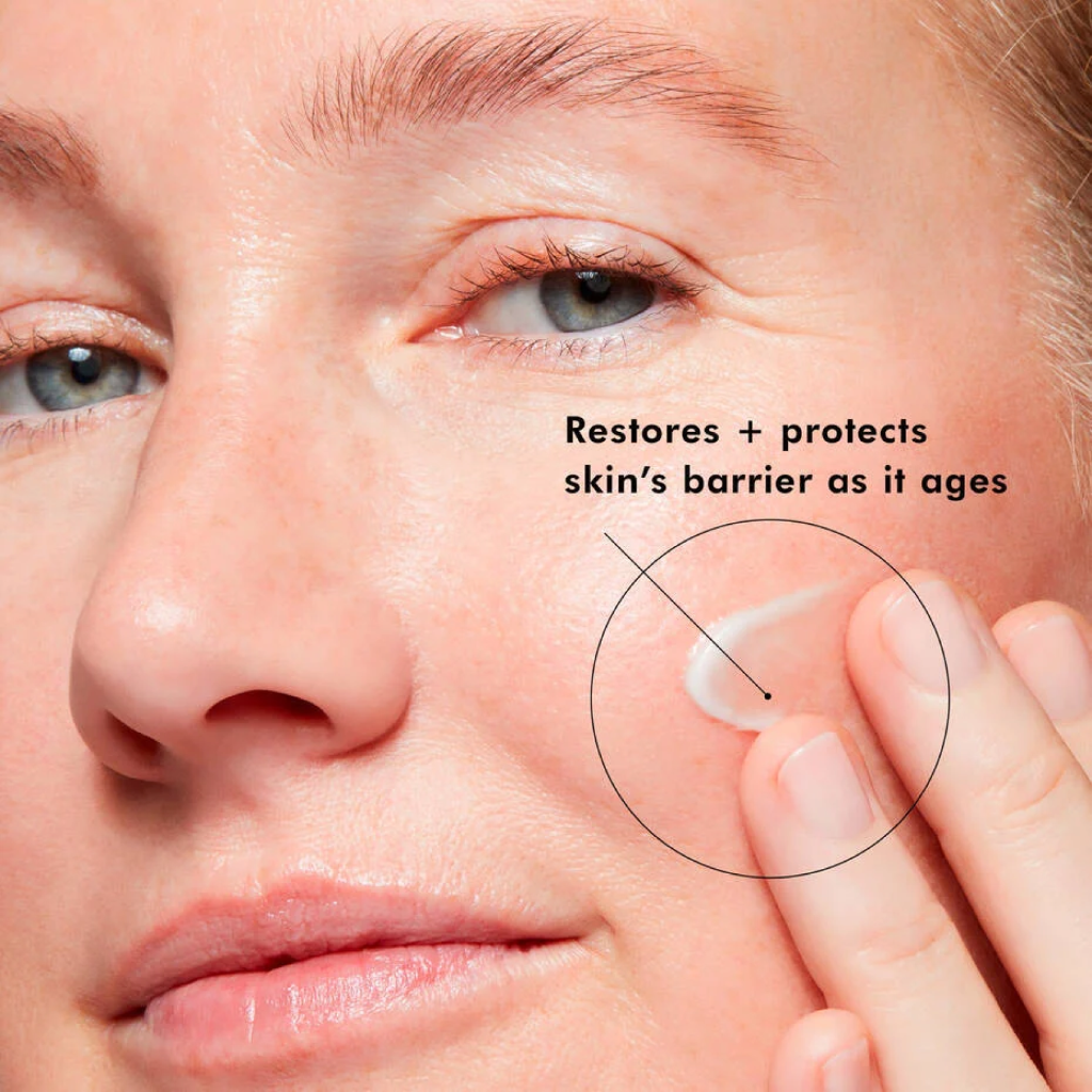 Swatch of SkinCeuticals Triple Lipid Restore 2:4:2 cream on fair skin showing texture and finish