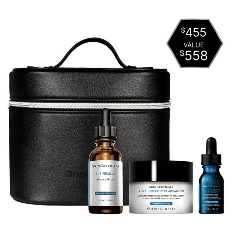 The Skinceuticals Holiday The Age Rewind Set displayed with its skincare product contents (C E Ferulic, A.G.E. Interrupter Advanced, and A.G.E. Interrupter Ultra Serum) in a black travel case with a price tag on a white background