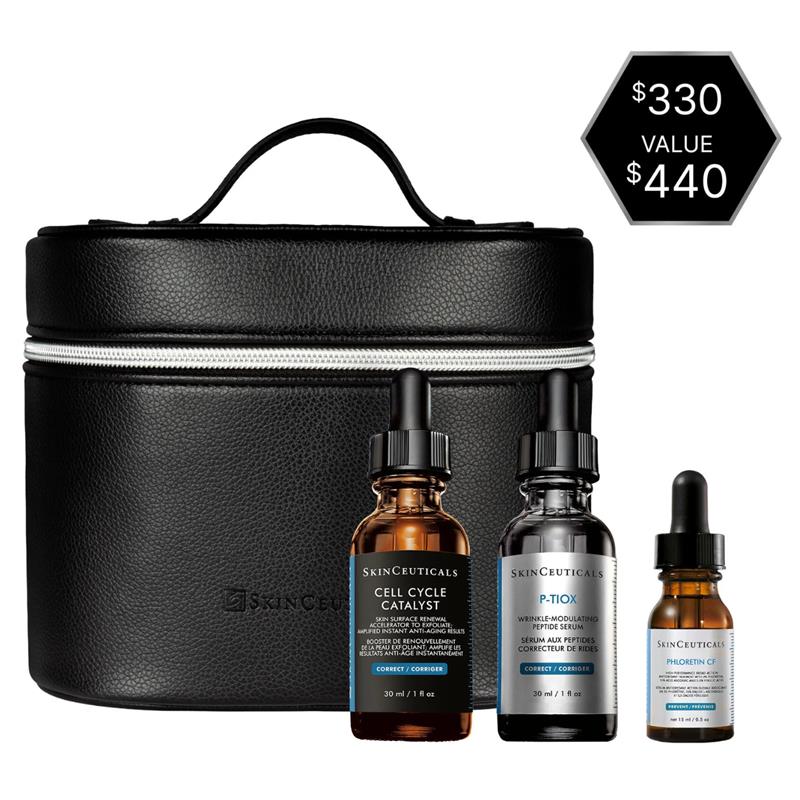 The Skinceuticals Holiday The Glass Skin Set displayed with its skincare product contents (Cell Cycle Catalyst, P-Tiox, and Phloretin CF) in a black travel case with a price tag on a white background