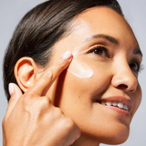 Applying Vivier Illuminating Enzymatic Peel to the face for glowing, smooth, and radiant skin