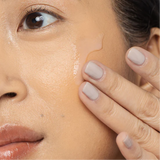 Image of a model's face with Vivier Medicated Wash gently smeared on, illustrating the smooth application of salicylic acid cleanser and toner designed for oily, acne-prone skin