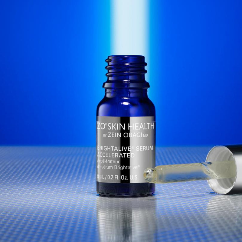 ZO Brightalive Serum Accelerated bottle open with dropper showcasing clear serum texture.