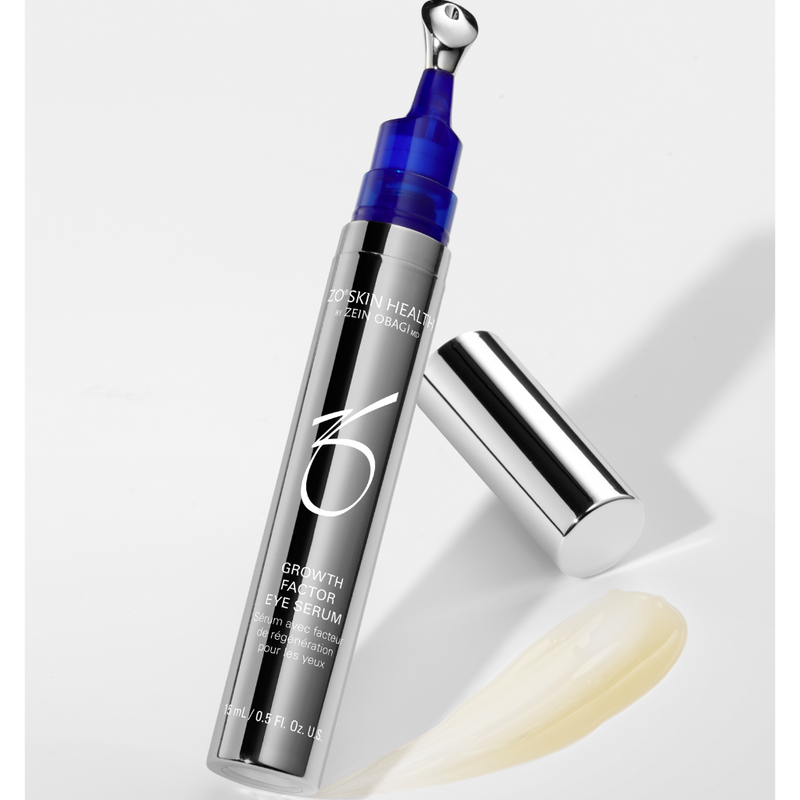 ZO Growth Factor Eye Serum with the cap removed, displaying a swatch of its lightweight, retinol-free formula designed to smooth lines and wrinkles around the eyes