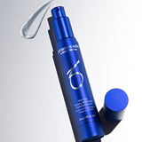 ZO Peptide Facial Refining Concentrate bottle with a swatch of its lightweight serum on a light gray background