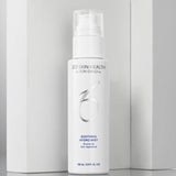 The ZO Soothing Hyro Mist in a sleek and elegant pump bottle infront of white blocks