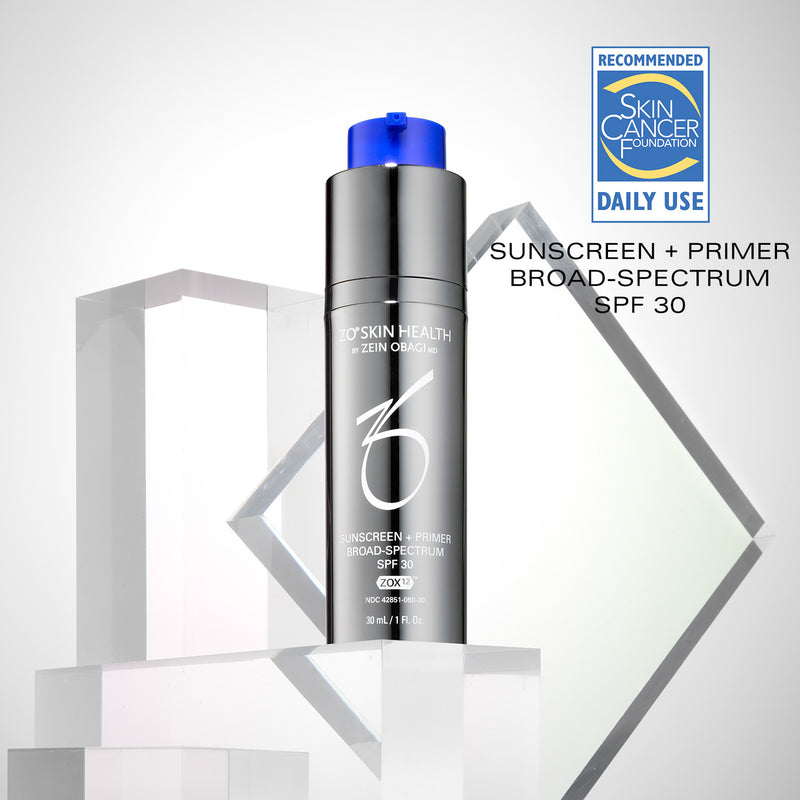 Product image of ZO® Sunscreen + Primer Broad-Spectrum SPF 30 with the Skin Cancer Foundation Recommended seal, showcasing its sleek silver and white packaging and dual-action formula that provides advanced sun protection and a smooth, matte primer finish.