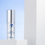 iS Clinical Eye Complex displayed on a white stand showcasing under-eye treatment product