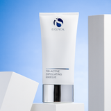 iS Clinical Tri-Active Exfoliating Masque displayed on top of a white product box, set against a gradient blue background