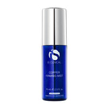 The iS Clinical Copper Firming Mist blue bottle with silver cap on a white background