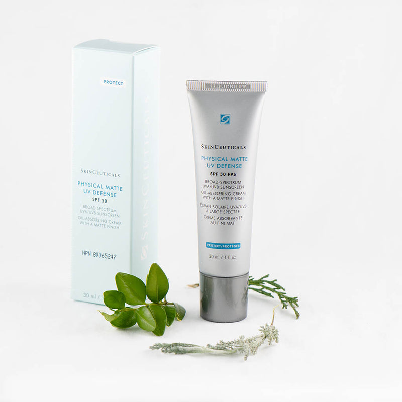 SkinCeuticals Physical Matte UV Defense SPF 50 sunscreen displayed with green plants highlighting natural ingredients