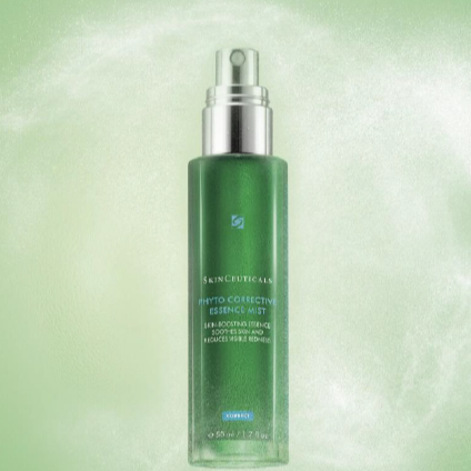 SkinCeuticals Phyto Corrective Essence Mist bottle displayed against a soft gradient green background, highlighting its refreshing and calming botanical formula.