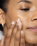 Vivier V-Stat Advanced Repair Gel gently applied to the face, demonstrating its smooth texture for effective skin repair and healing