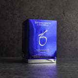 ZO Skin Brightening Program box placed on a grey concrete background, showcasing its professional skincare regimen for diminishing discoloration and improving skin tone.
